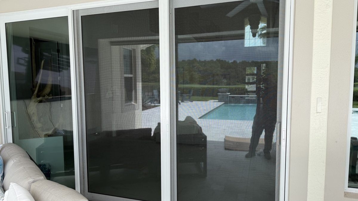 Lanai screen panel being re-meshed